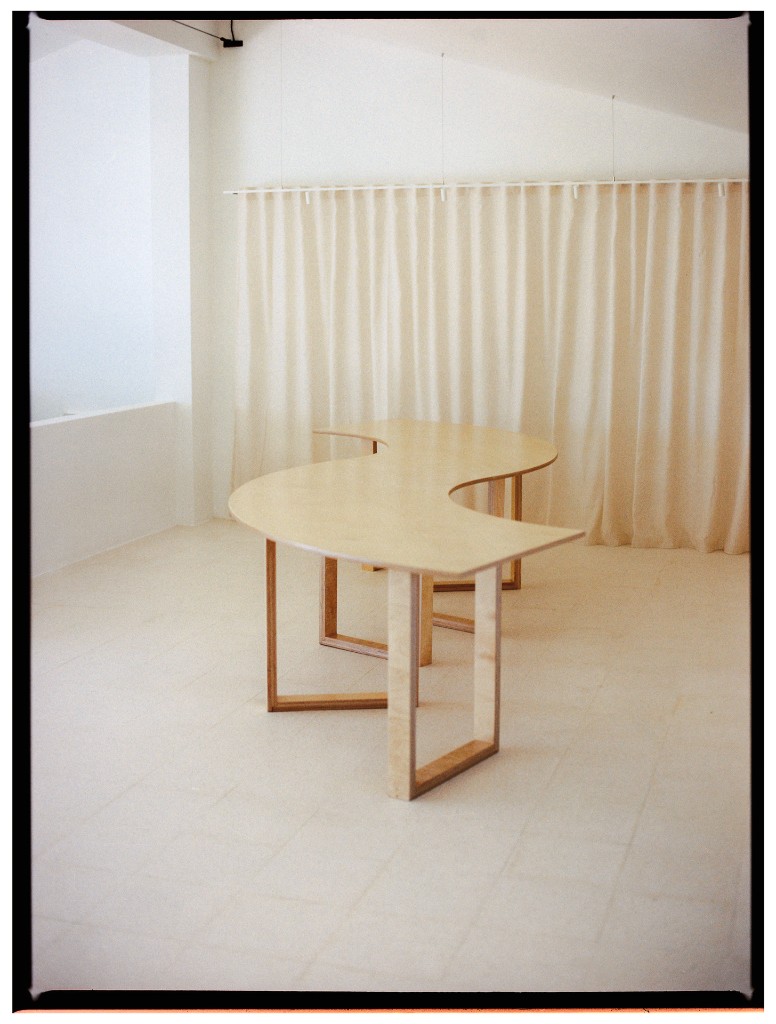 Curved wooden table